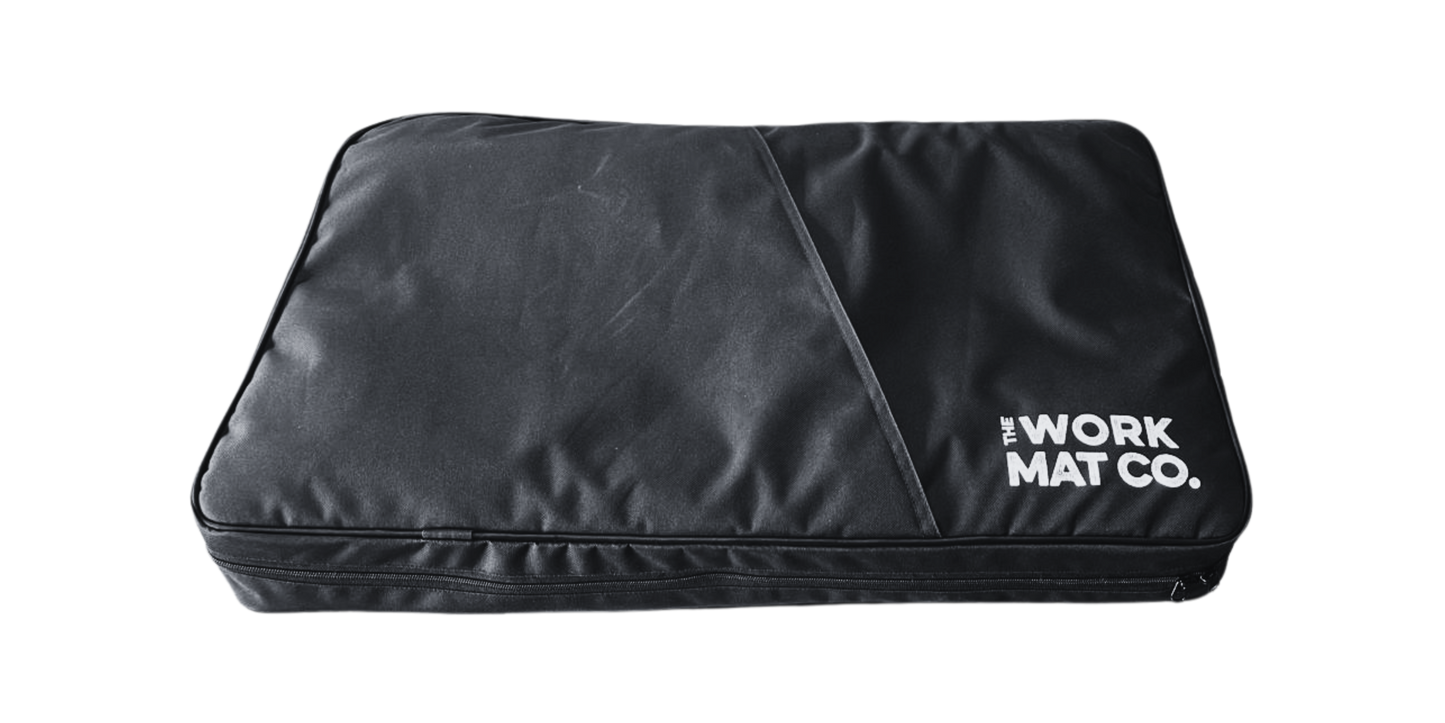 Large black canvas suitcase like carry case for the mats and pads