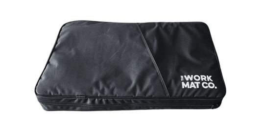Large black canvas suitcase like carry case for the mats and pads
